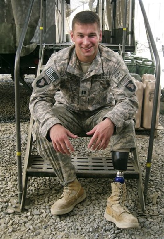 Capt. Dan Luckett, 27, of Norcross, Ga., takes a seat at Combat Outpost Ashoqeh in Afghanistan's Kandahar province. Luckett lost his left leg and part of his right foot in a bomb blast in Iraq in 2008.